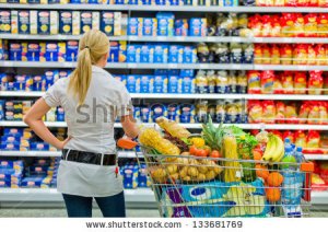stock-photo-a-woman-is-overwhelmed-with-the-wide-range-in-the-supermarket-when-shopping-133681769