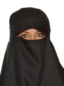 Beautiful Middle eastern woman in niqab traditional veil against a white background